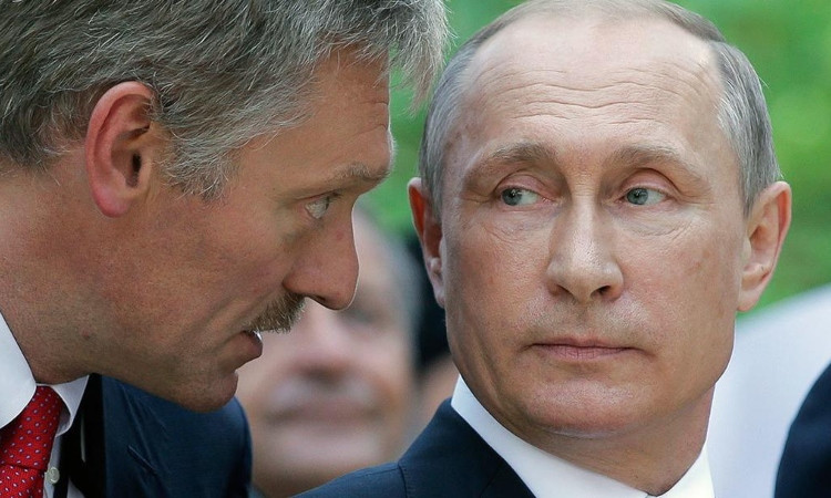 peskov-putin_R1CR6.jpg