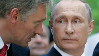 peskov-putin_R1CR6.jpg