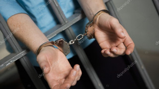 depositphotos21973065-stock-photo-criminal-handcuffed-to-bars_zILr-.jpg