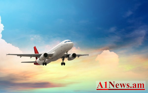 depositphotos47734669-stock-photo-airplane-flying-above-tropical-sea_RAmx4.jpg