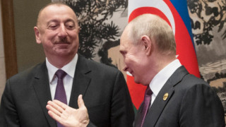 putin-aliev-handipum_9NAEA.jpg